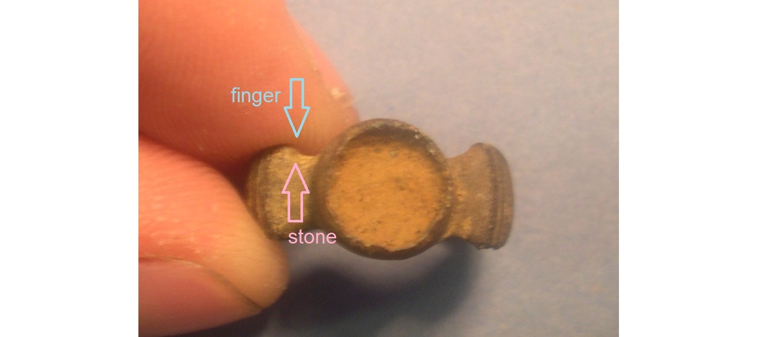 finger on stone